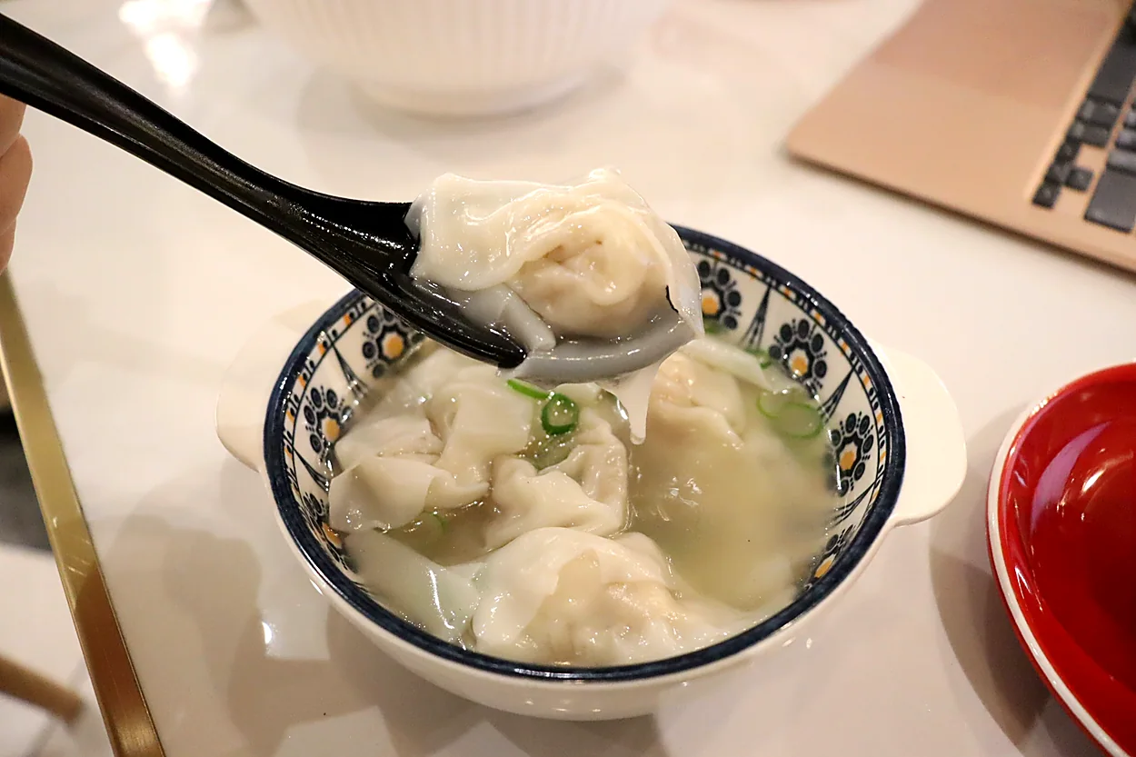 Wontons served in a warm broth